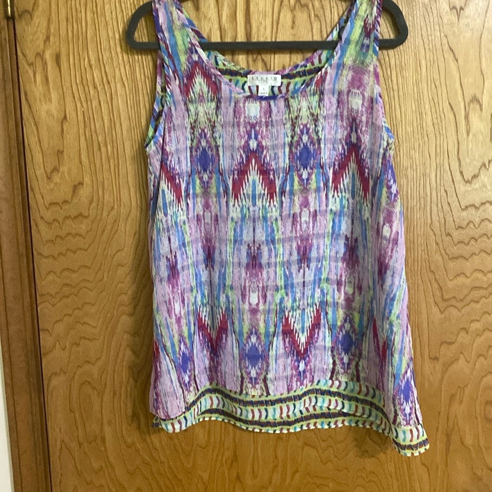 Beautiful colors completely lined sheer tank top